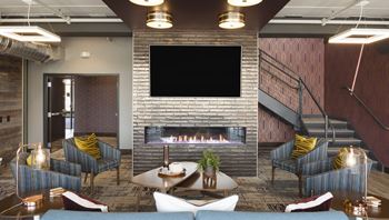 Quaint fireplace sitting area in clubroom